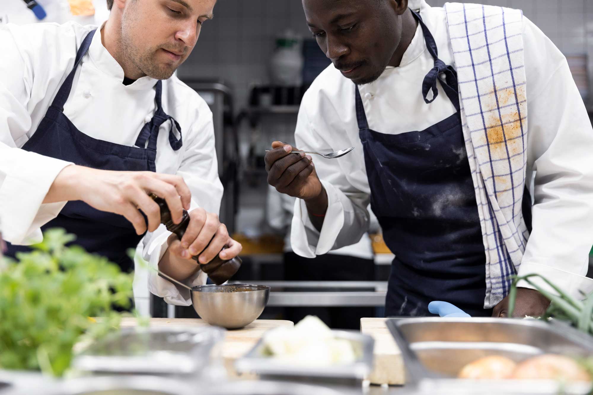 Two chefs in a kitchen
