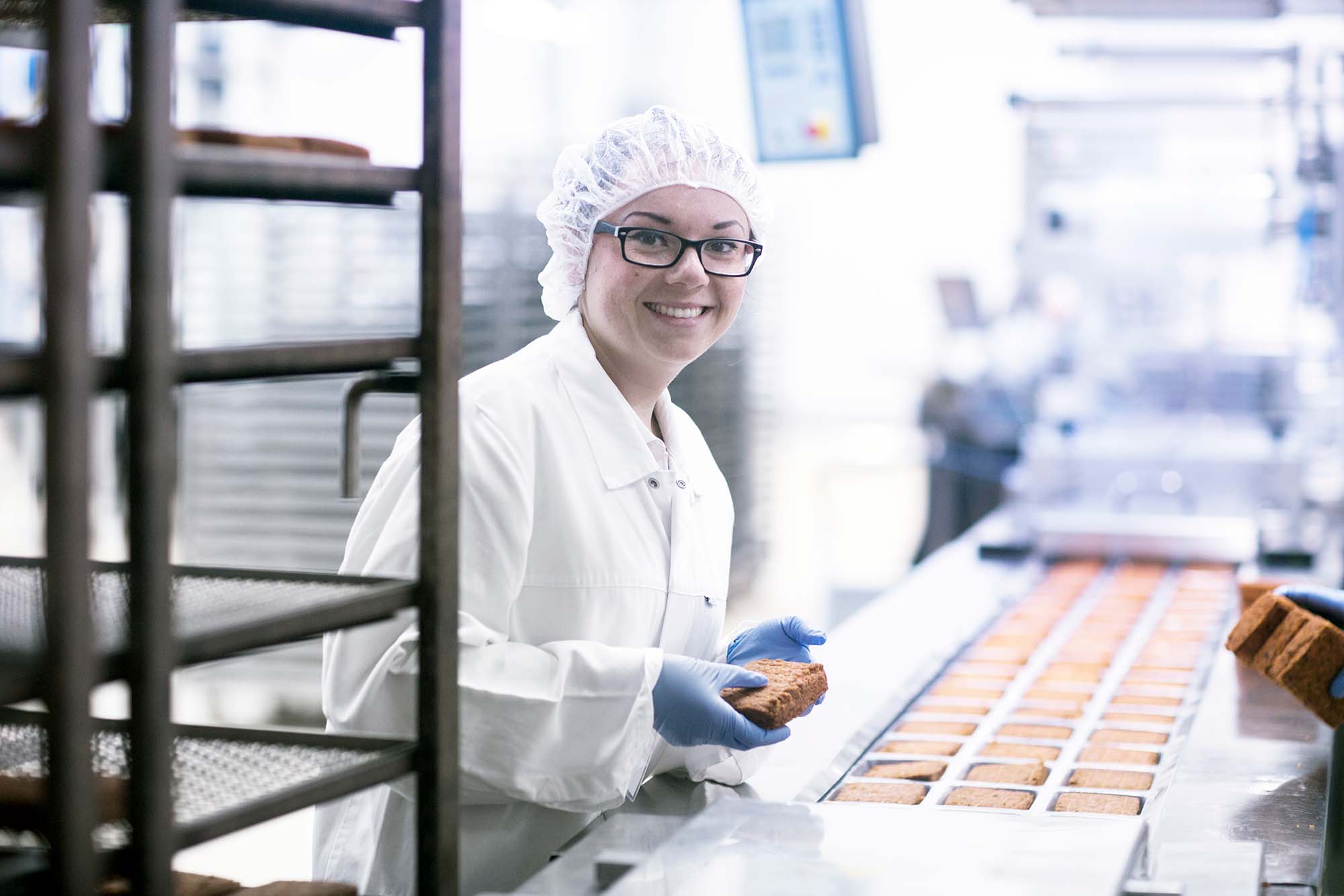 A woman in a food manufacturing facility